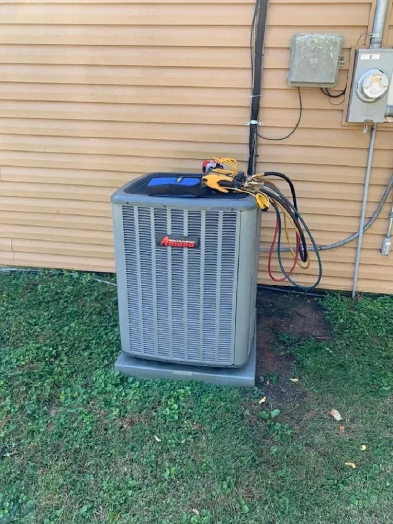 Different types and sizes of air conditioning units displayed in a home setting